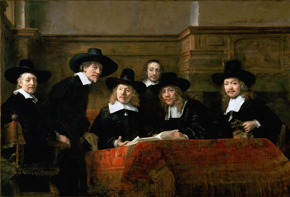Rembrandt, Le Syndic de la guilde des drapiers (1662) : six hommes réunis autour d’une table recouverte d’un tapis rouge, avec un livre ouvert.